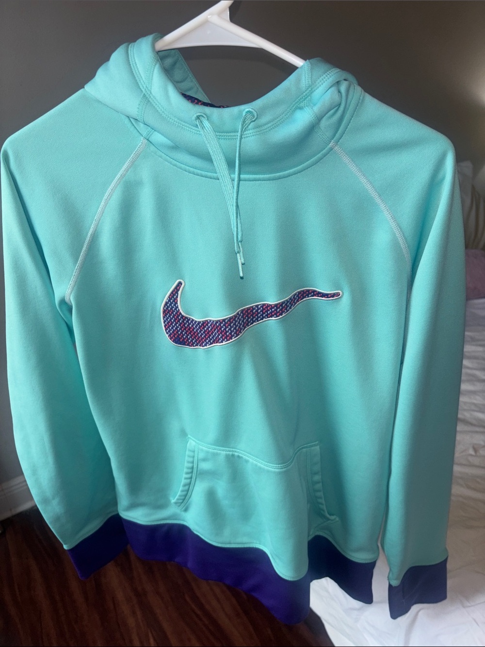 Nike Mint Green Hoodie with Multicolor Swoosh and Purple Trim